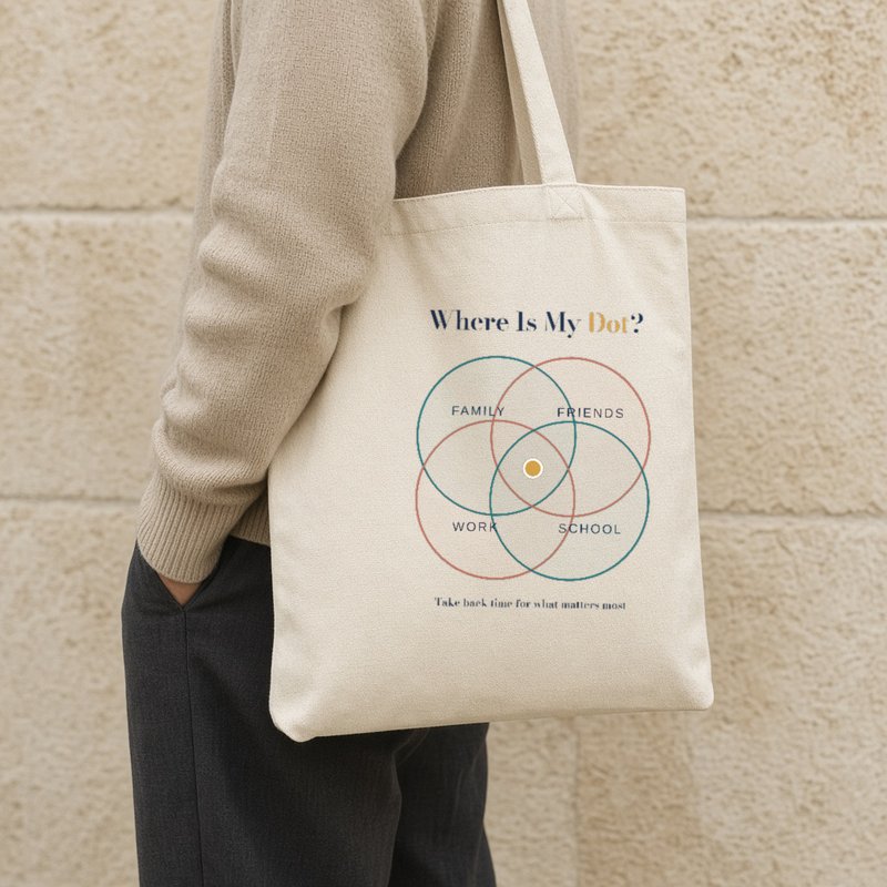 A natural cotton tote bag with the Where Is My Dot? four-circle design.